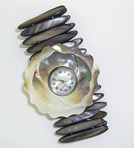 Elegant flower shaped sea shell stretch bracelet watch in shades of white, beige, and dark brown